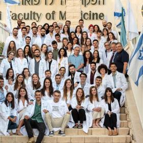 Group Picture White Coat June21